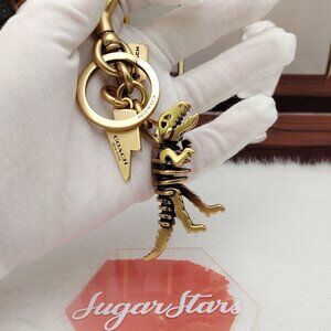 Coach rexy bag charm